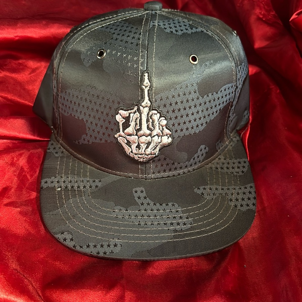 Flat-bill camo skeleton finger snap back hat